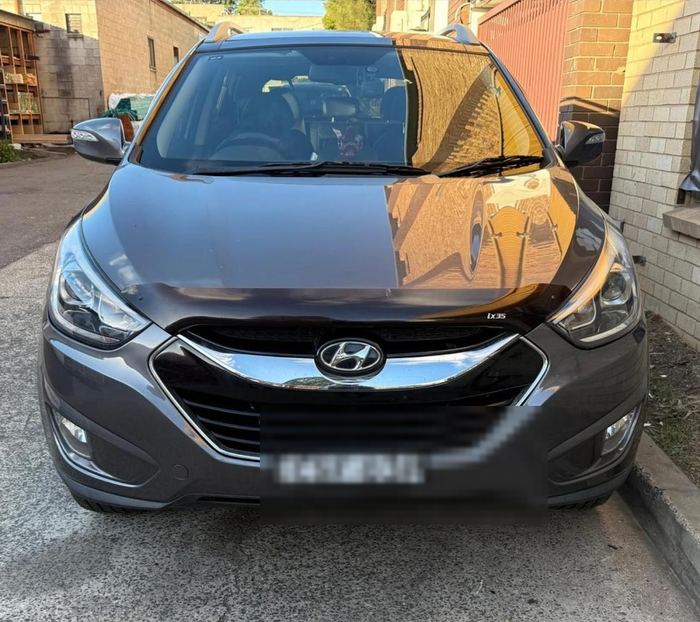 Same Hyundai ix35 fully repaired with new bumper and headlight